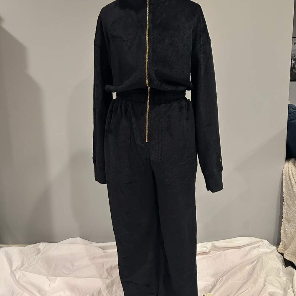 Stay warm and cozy in this fabulous jumpsuit.